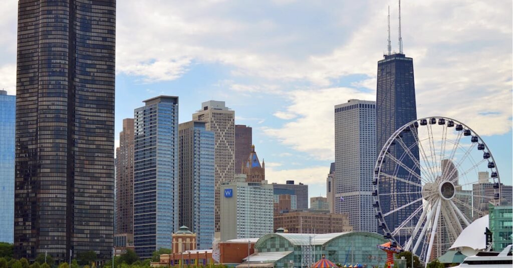 Chicago skyline featuring the iconic Ferris wheel on Navy Pier with skyscrapers like Hancock Tower.