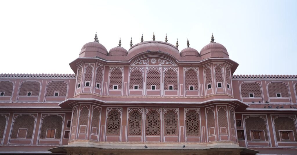 Front view of the iconic architecture of Jaipur Fort, showcasing detailed design and vibrant colors.